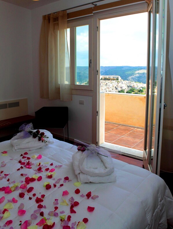 Down comforters, minibar, in-room safe, desk