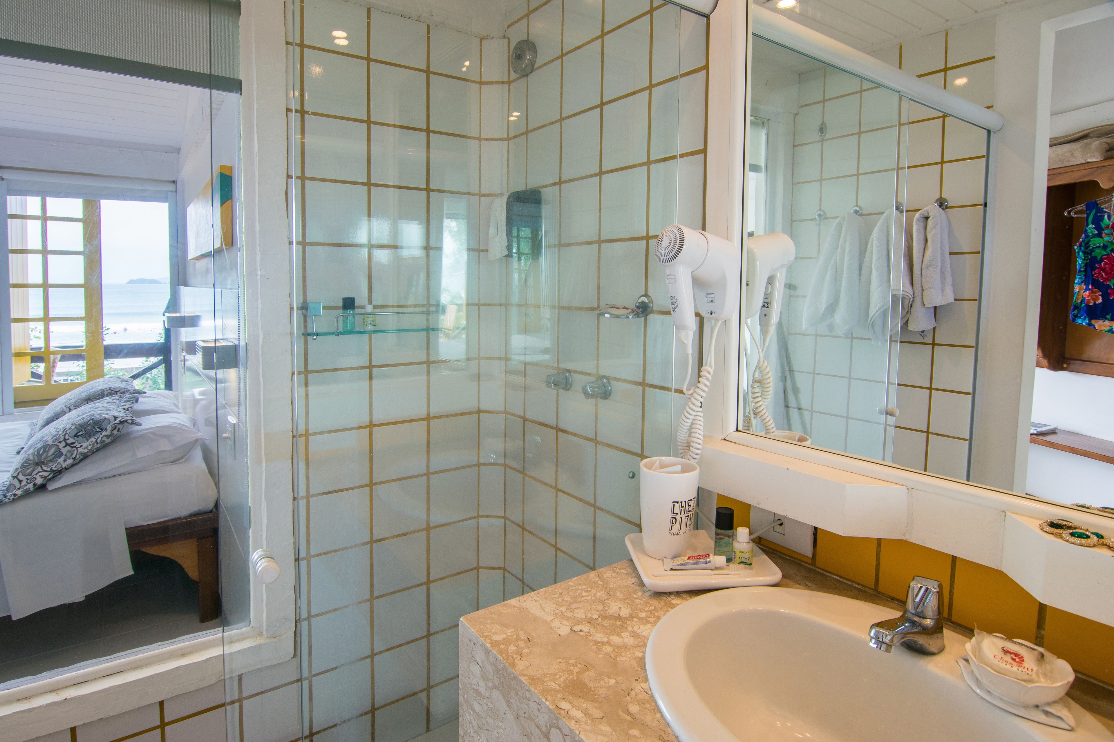 standard room | bathroom | shower, free toiletries, hair dryer, towels