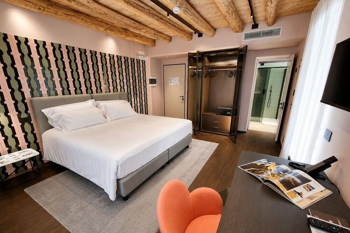 Premium bedding, down comforters, memory foam beds, minibar