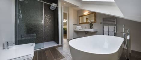 Shower, rainfall showerhead, designer toiletries, hair dryer