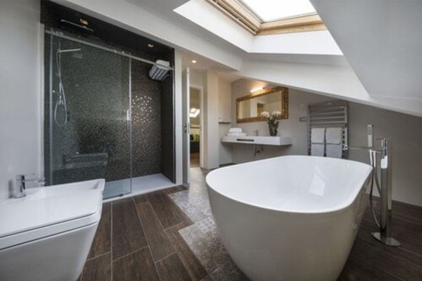 Shower, rainfall showerhead, designer toiletries, hair dryer