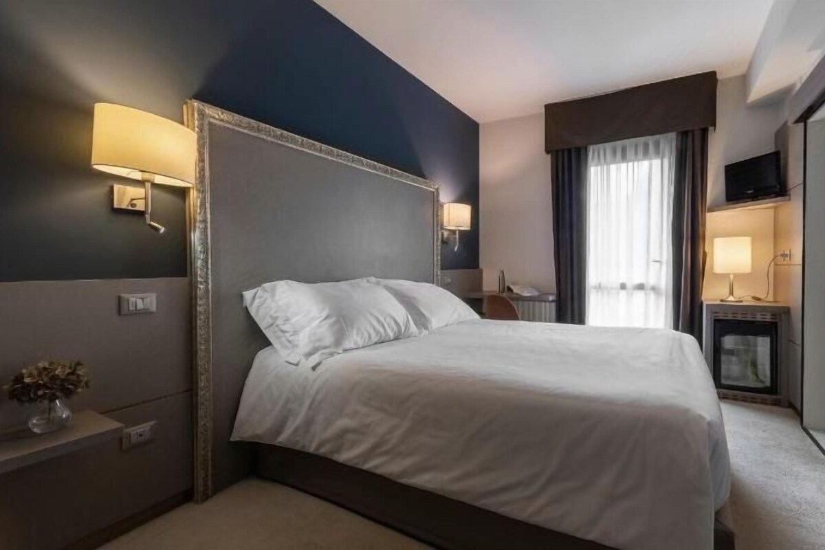 Premium bedding, down comforters, memory foam beds, minibar