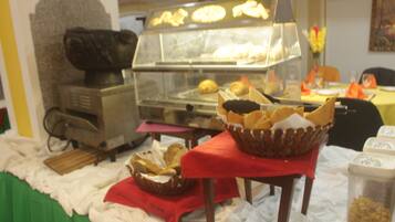 Daily buffet breakfast (USD 14 per person)