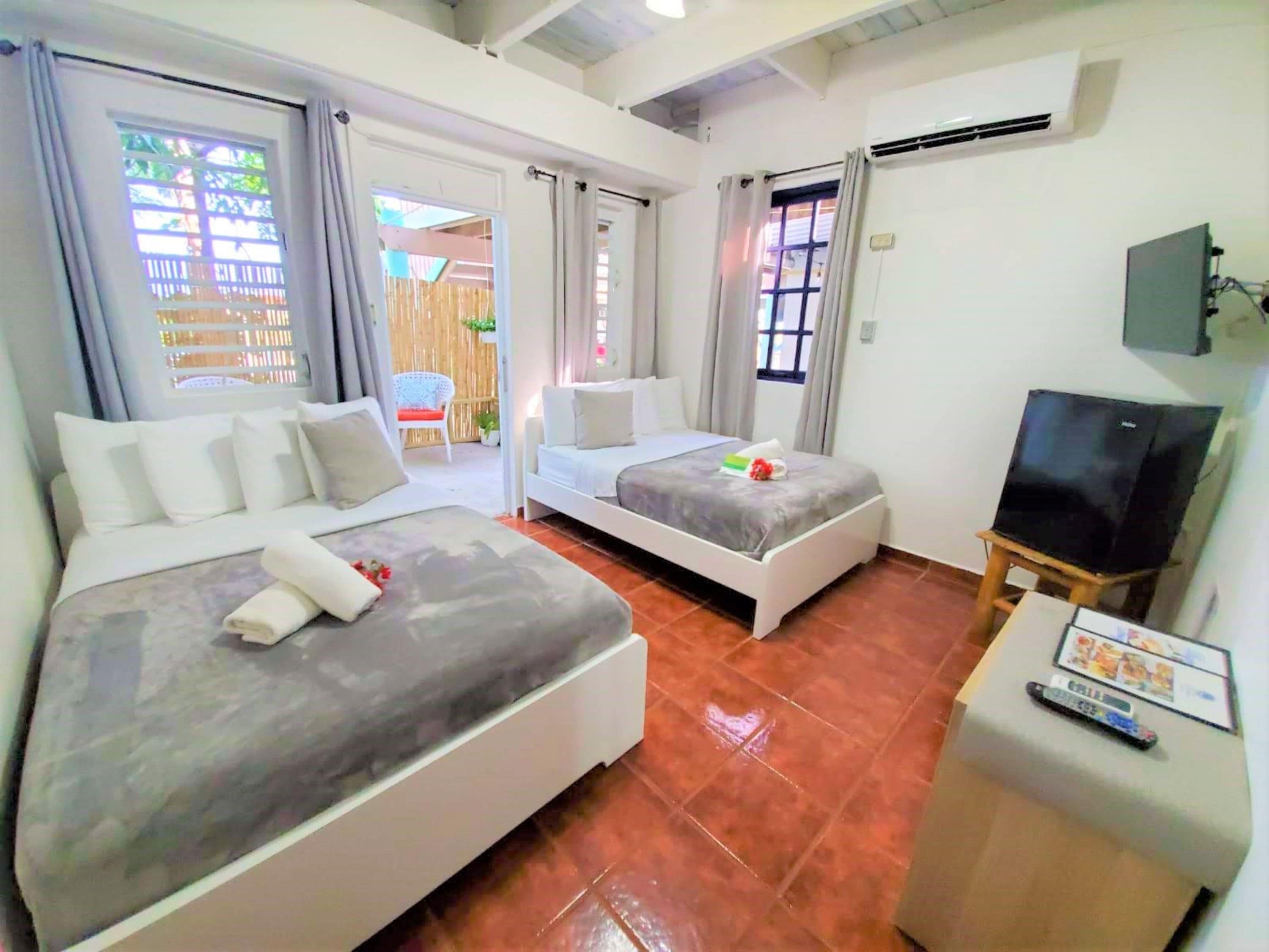 standard double room, 2 double beds | individually decorated, individually furnished, iron/ironing board