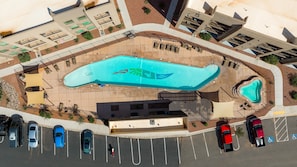 Seasonal outdoor pool, open 6 AM to 10:00 PM, pool loungers