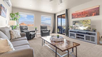 Two Bedroom Condo | Living room | 32-inch Smart TV with digital channels, streaming services