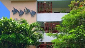 A building with a sign reading "The Angel's Resort."