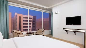 Suite Deluxe, 1 cama de matrimonio grande | Vistas a la ciudad