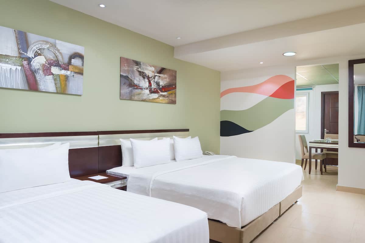 Family Suite | Minibar, in-room safe, desk, iron/ironing board