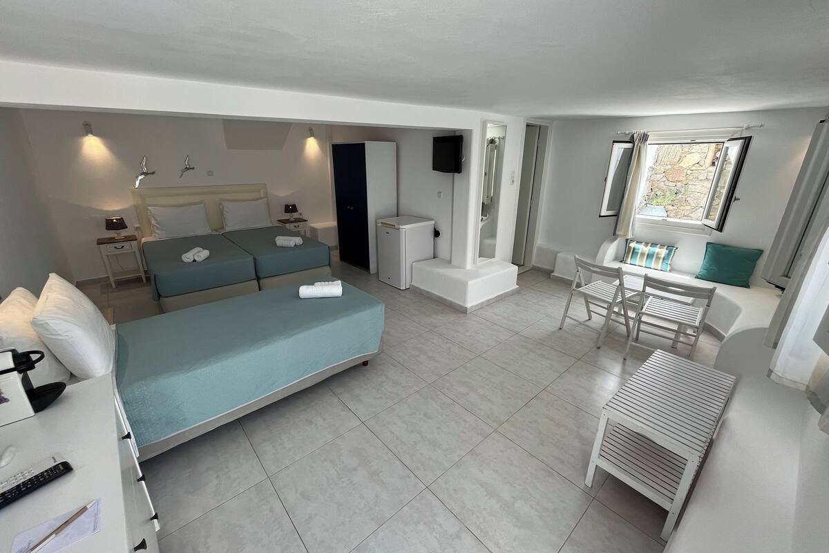 triple room, garden view | 1 bedroom, pillow-top beds, in-room safe, soundproofing