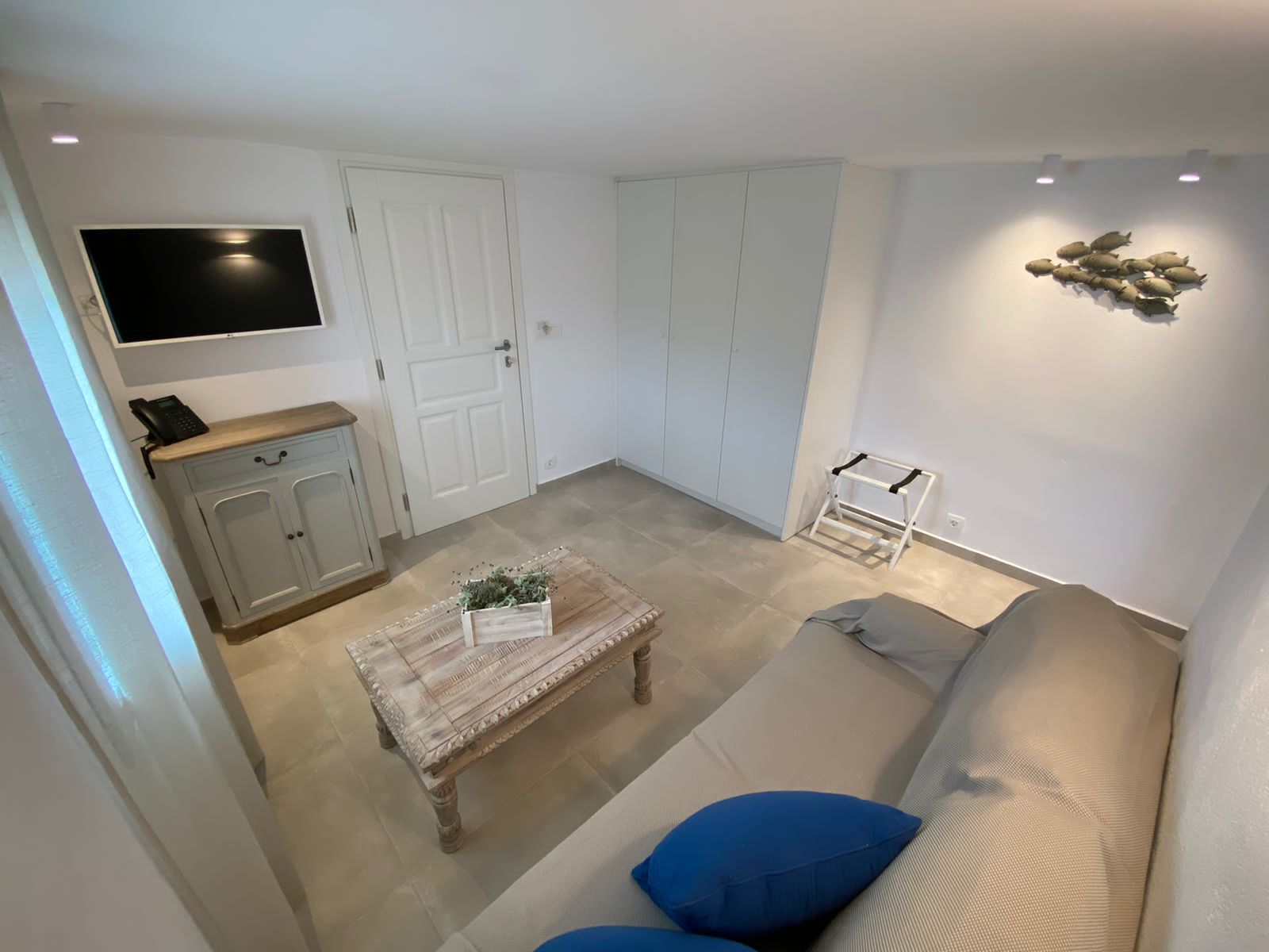 deluxe suite, 1 bedroom, sea view | living area | 28-inch lcd tv with digital channels, tv