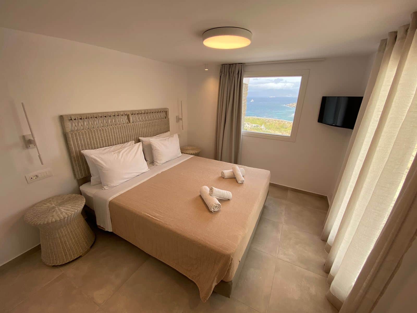 Deluxe Suite, 1 Bedroom, Sea View | Pillowtop beds, in-room safe, soundproofing, free WiFi