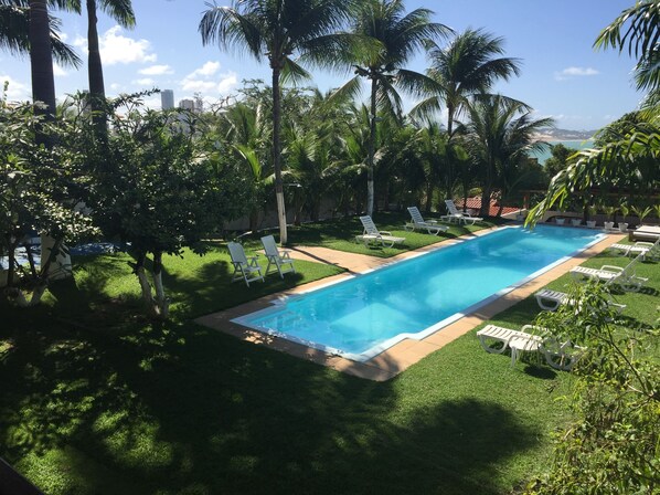 Outdoor pool, pool umbrellas, pool loungers