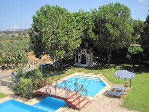Outdoor pool, pool umbrellas, pool loungers