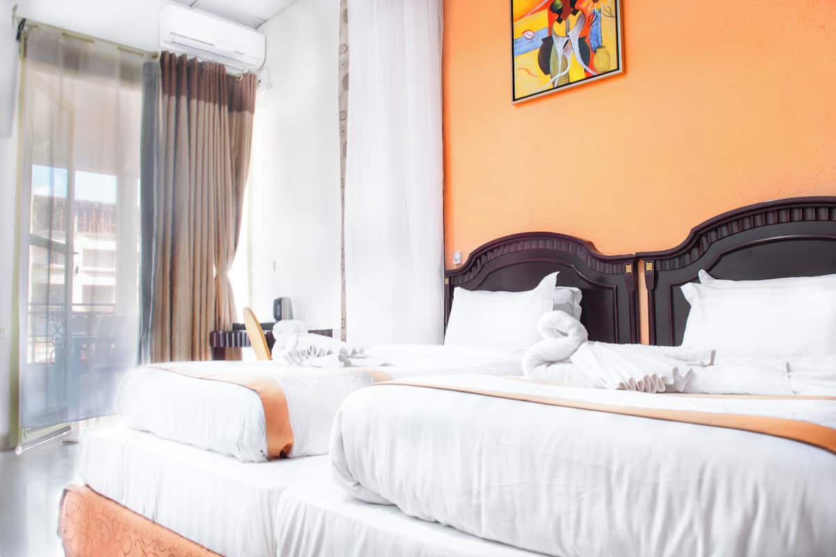 Basic Twin Room, 1 Bedroom, Non Smoking, Balcony | In-room safe, blackout drapes, iron/ironing board, free WiFi