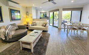 Superior Apartment, 1 Bedroom, Non Smoking, Pool View | Living area | 45-inch Smart TV with digital channels, TV, streaming services - Noosa River Retreat (Noosaville)