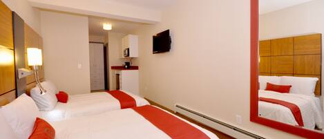 Deluxe Room, 2 Double Beds | Down comforters, desk, blackout drapes, iron/ironing board