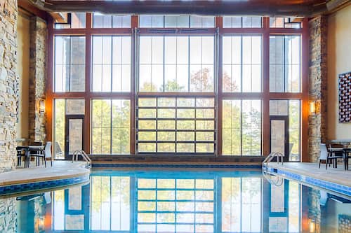 Indoor pool, seasonal outdoor pool, pool umbrellas, sun loungers