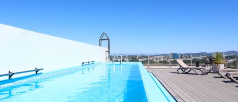 Outdoor pool, sun loungers