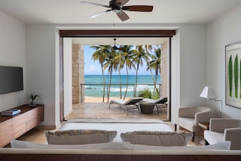 Minibar, in-room safe, desk, iron/ironing board at Dorado Beach, a Ritz-Carlton Reserve