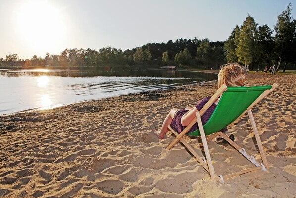 On the beach, water skiing, beach volleyball, fishing