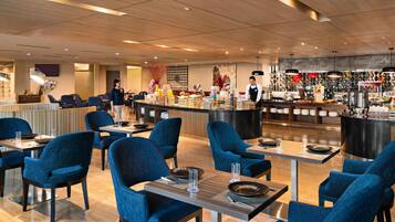 Breakfast, lunch, dinner served; international cuisine