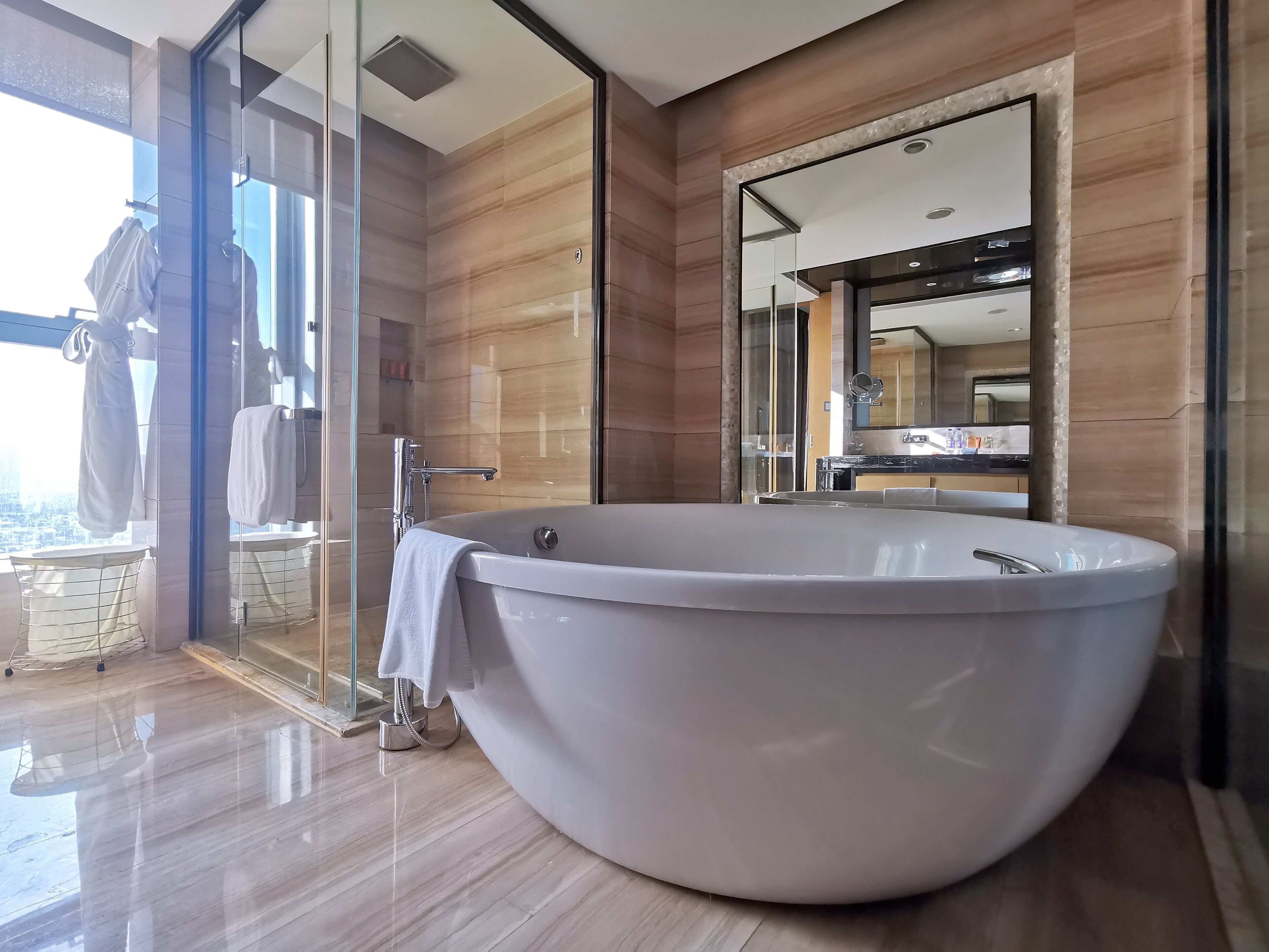 separate bathtub and shower, rainfall showerhead, free toiletries