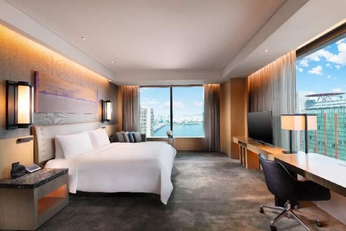 Premium bedding, down comforters, pillowtop beds, minibar