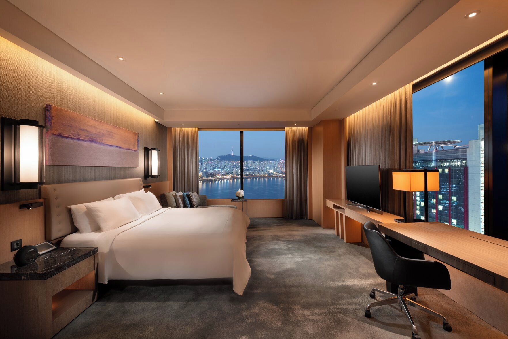 Premium bedding, down comforters, pillowtop beds, minibar