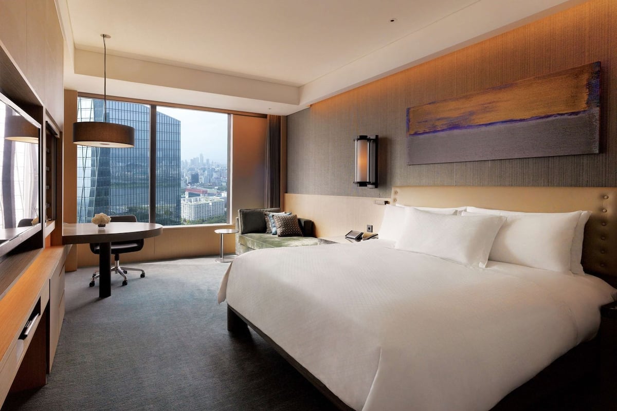 Premium bedding, down comforters, pillowtop beds, minibar