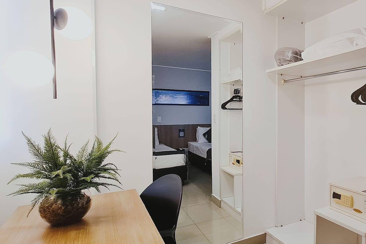 deluxe triple room | minibar, in-room safe, laptop workspace, blackout curtains