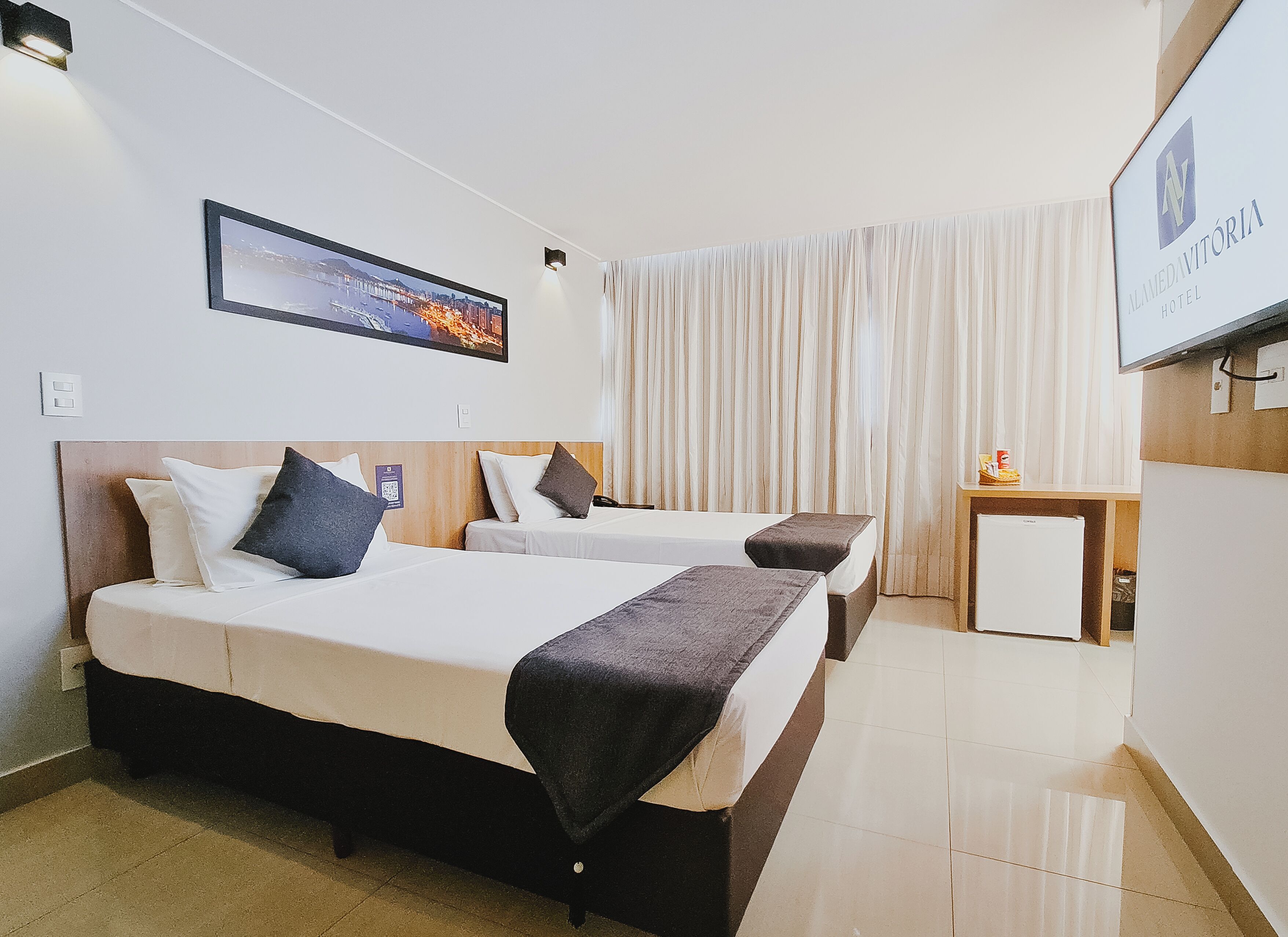 deluxe triple room | minibar, in-room safe, laptop workspace, blackout curtains