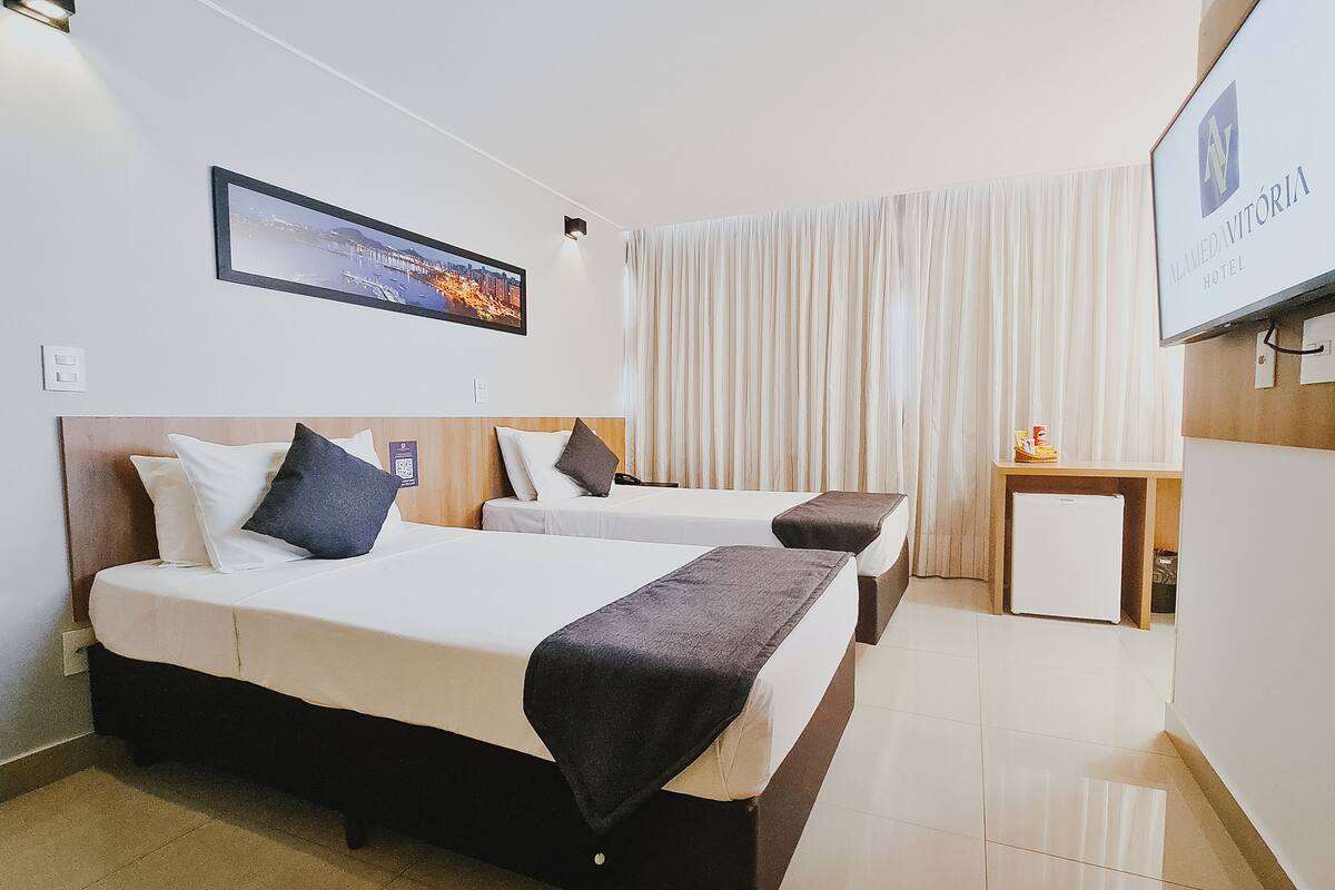 deluxe triple room | minibar, in-room safe, laptop workspace, blackout curtains