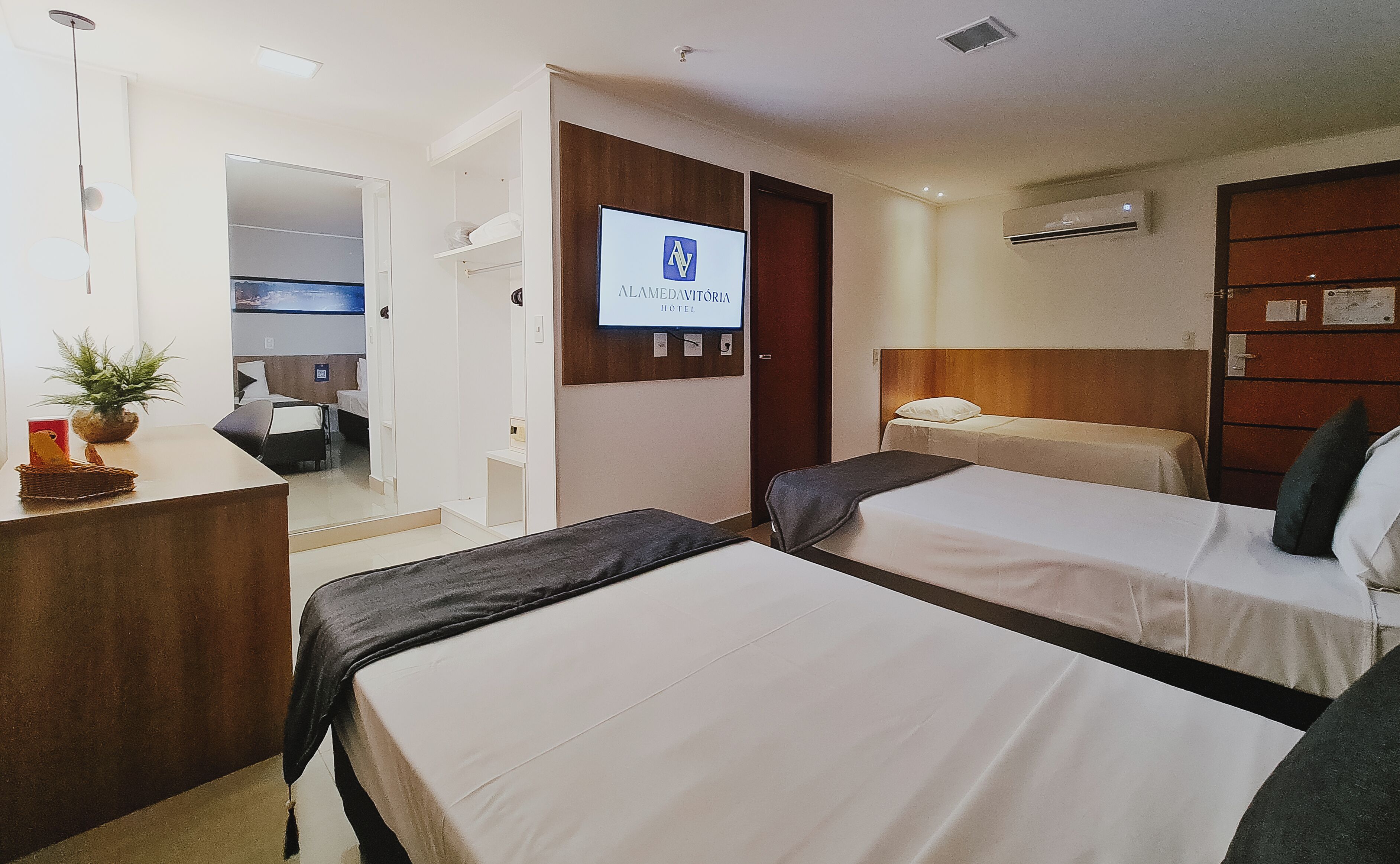deluxe triple room | minibar, in-room safe, laptop workspace, blackout curtains