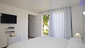 Habitación doble | Minibar, cortinas opacas, cunas (de pago) y camas supletorias