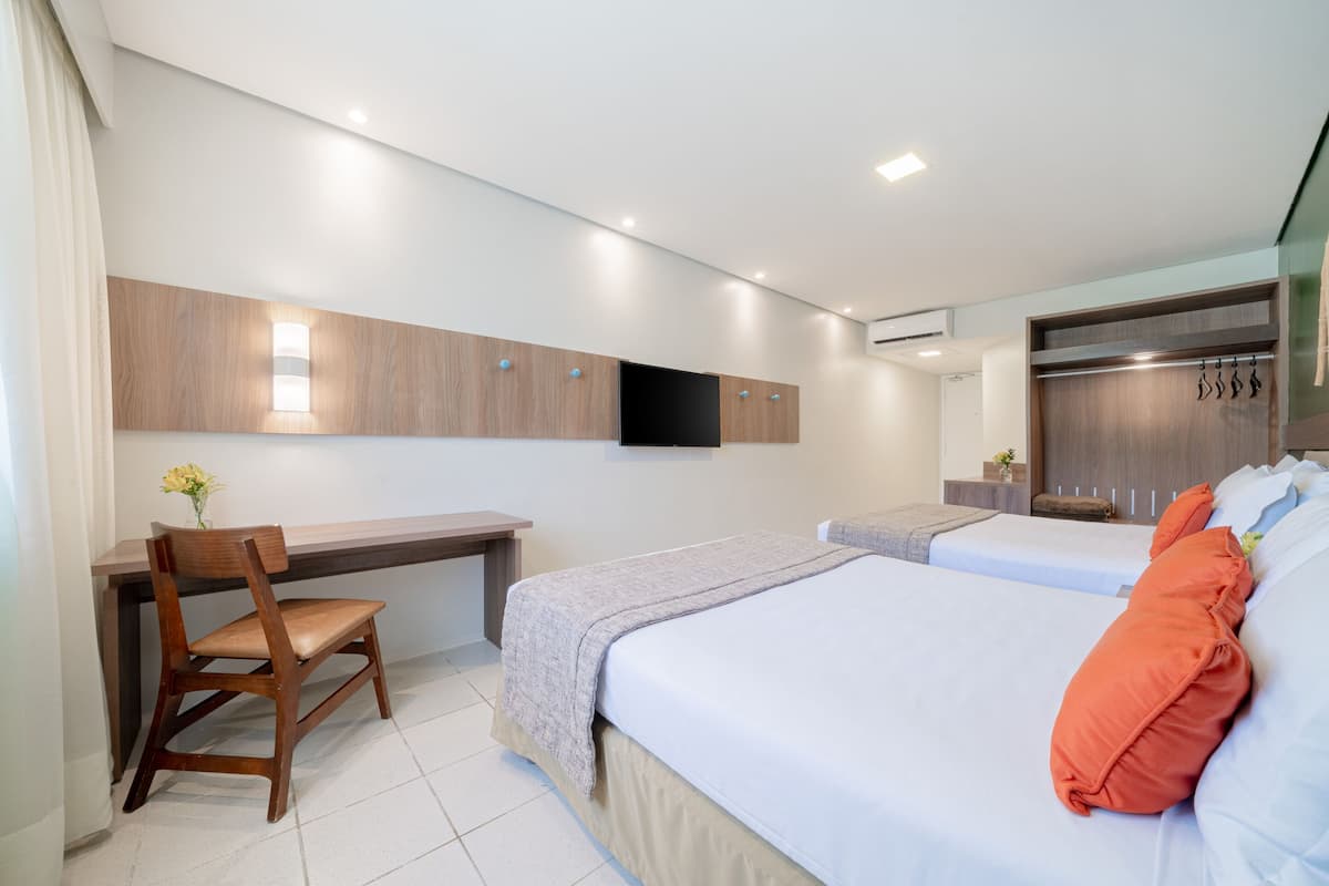 Junior Quadruple Suite | In-room safe, desk, free WiFi, bed sheets