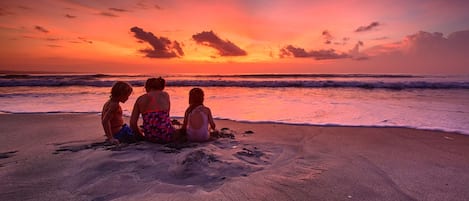 On the beach, beach towels, surfing