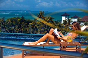 Outdoor pool, open 8:00 AM to 9:00 PM, cabanas (surcharge)