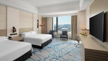 Habitación Club, 2 camas matrimoniales | 1 habitación, edredón, minibar y caja de seguridad en la habitación