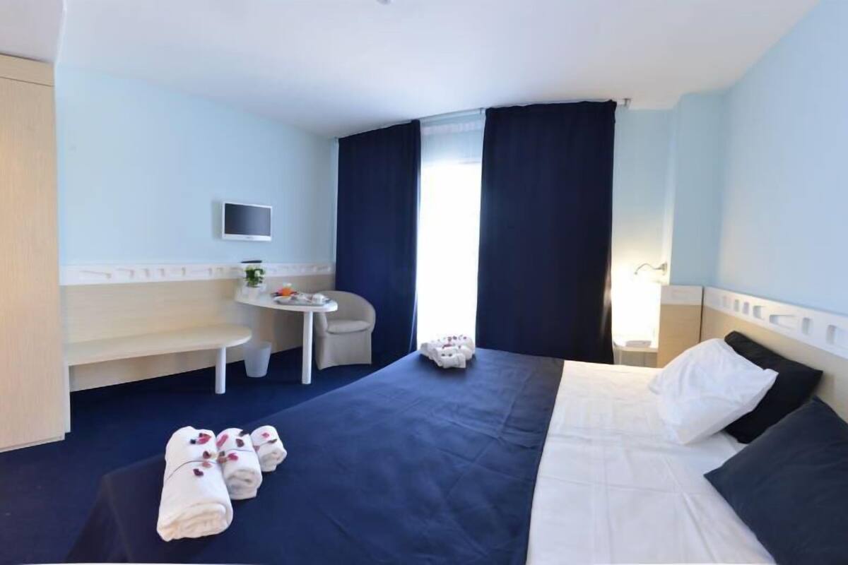 Standard Double or Twin Room | Down comforters, minibar, in-room safe, blackout drapes