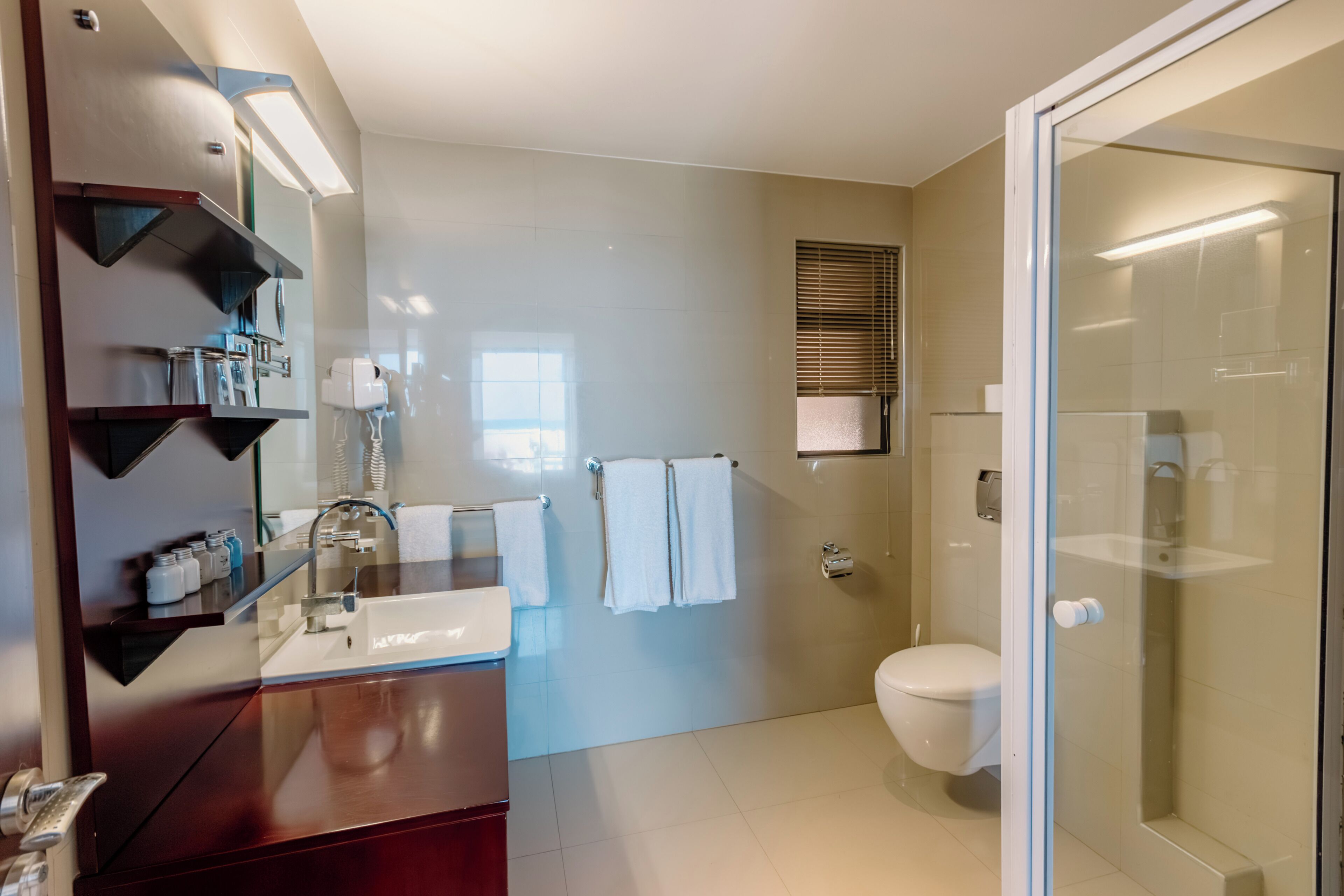 luxury apartment | bathroom | shower, rainfall showerhead, free toiletries, hair dryer