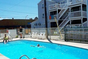 Seasonal outdoor pool, open 9:00 AM to 9:00 PM, pool loungers
