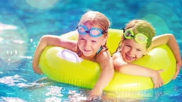 Seasonal outdoor pool, open 9:00 AM to 9:00 PM, pool loungers