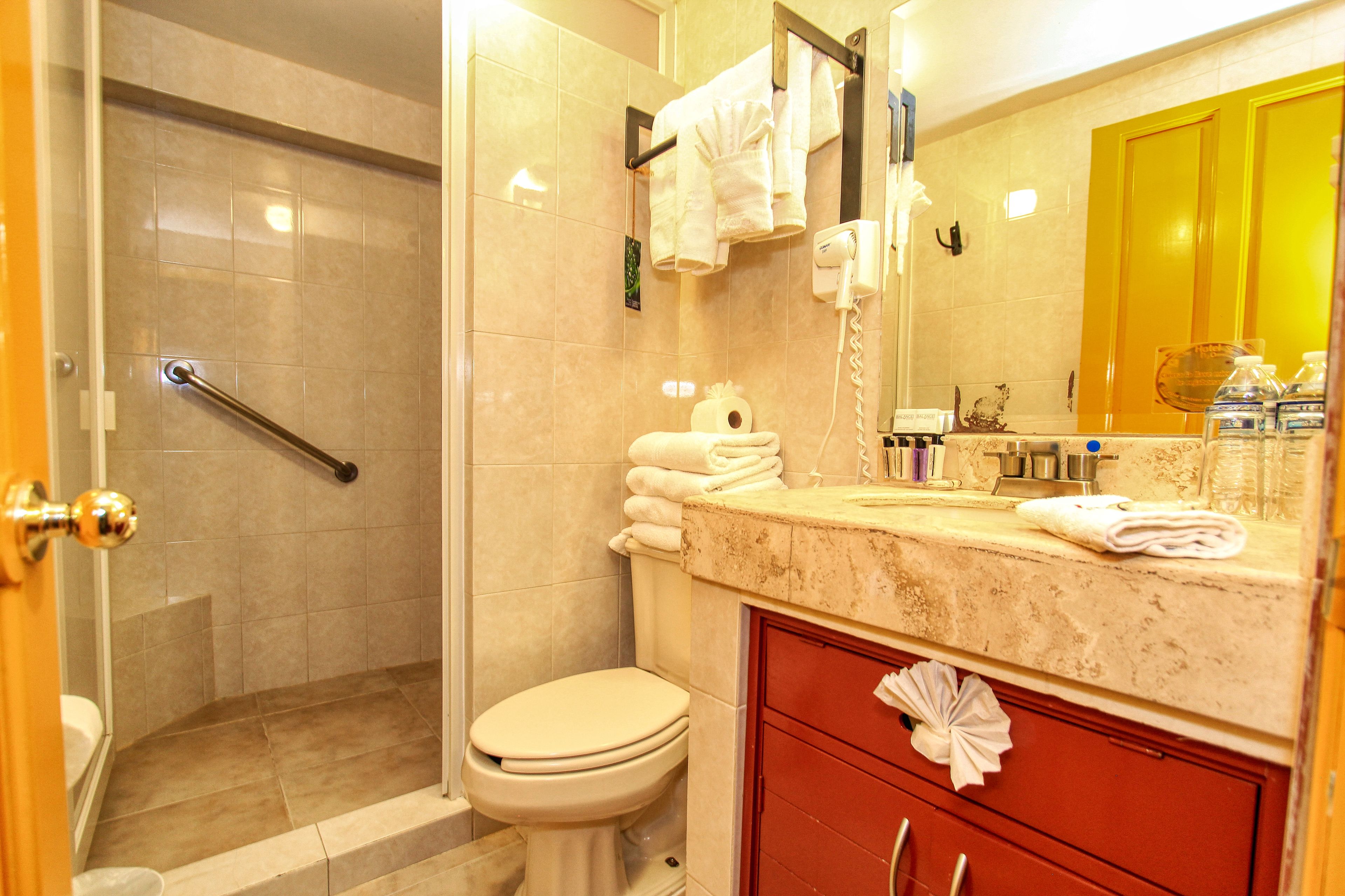 junior room, balcony, city view | bathroom | combined shower/bathtub, free toiletries, hair dryer, towels