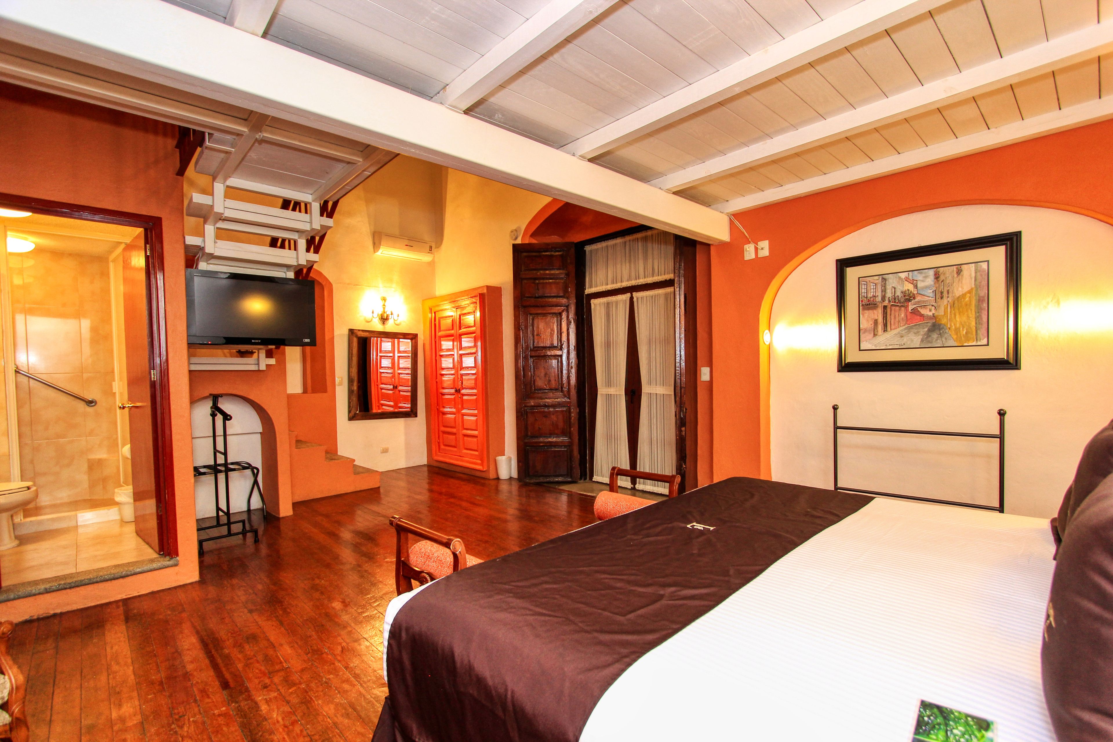 junior room, balcony, city view | 1 bedroom, in-room safe, iron/ironing board, free wifi