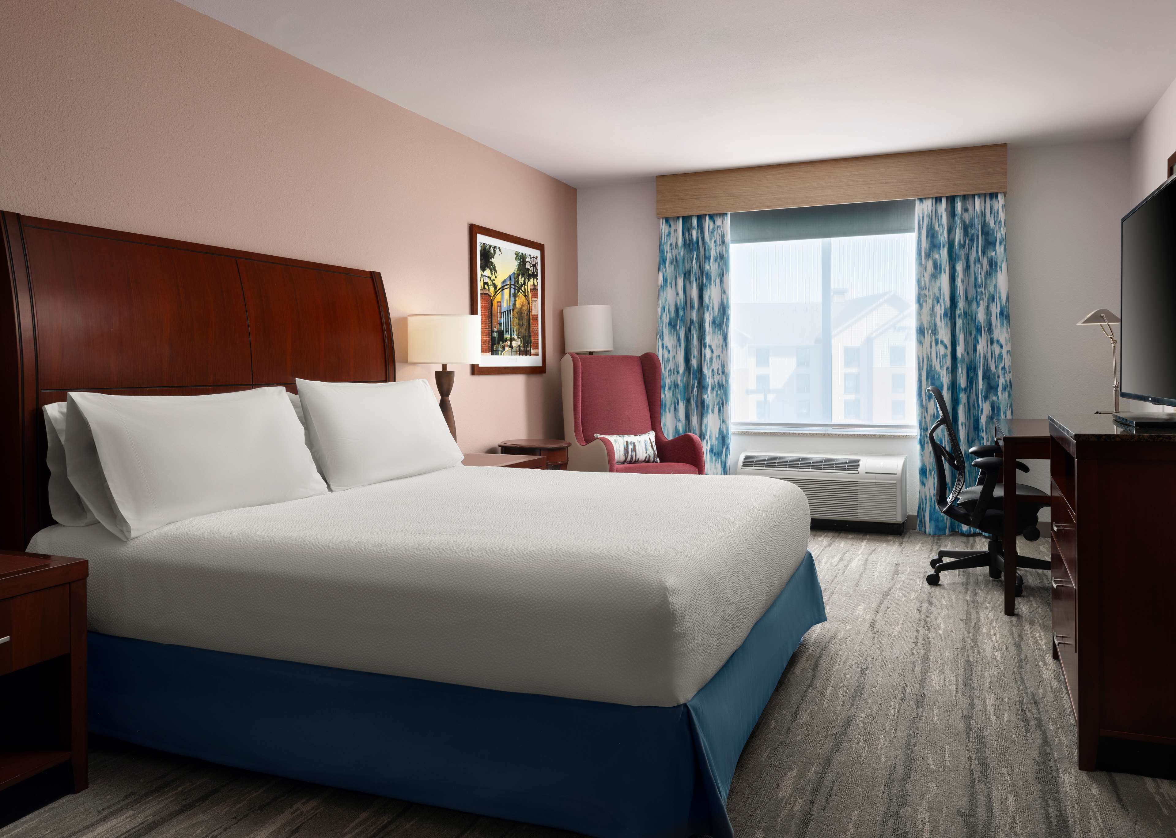 premium bedding, desk, blackout curtains, iron/ironing board