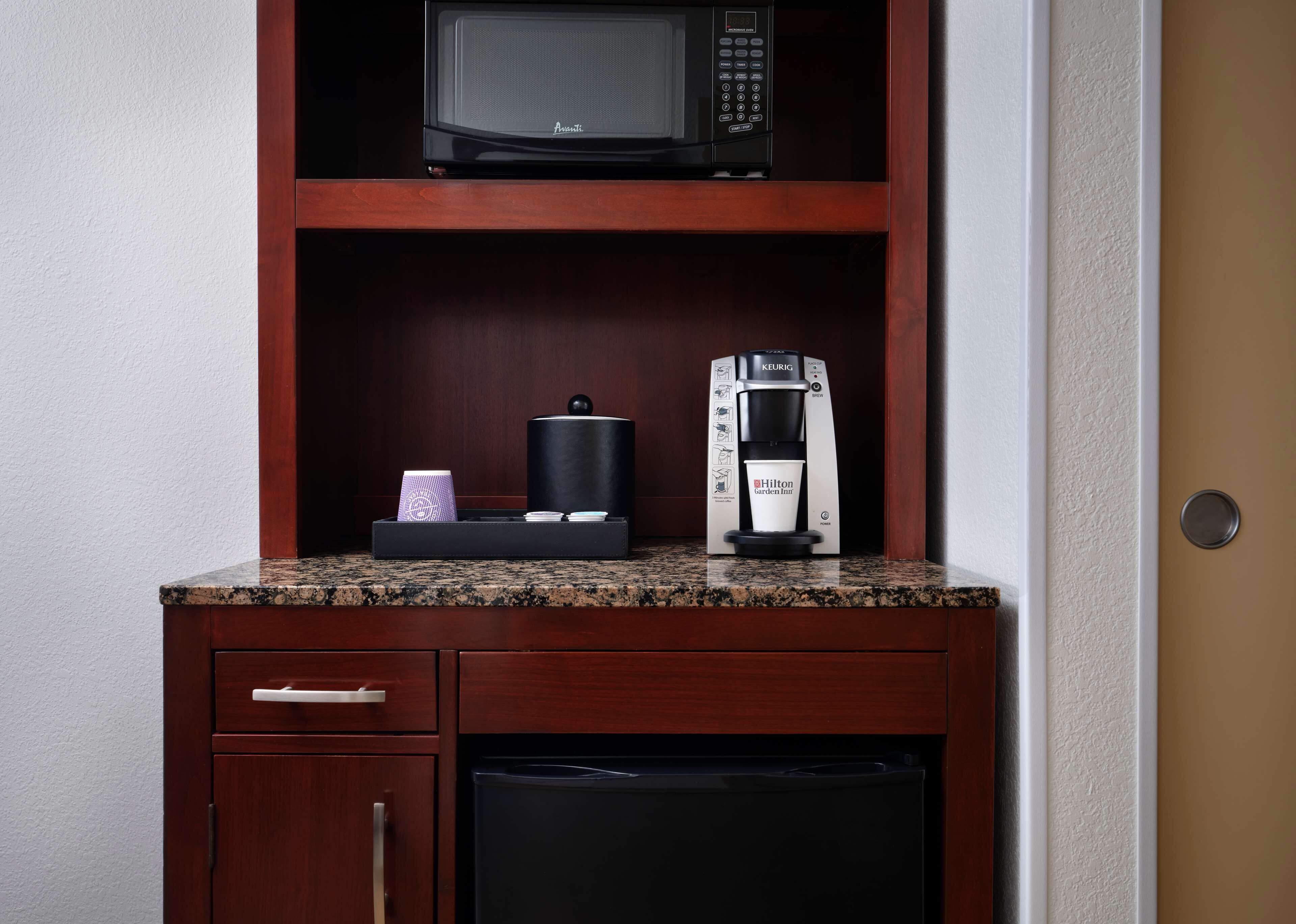 premium bedding, desk, blackout curtains, iron/ironing board