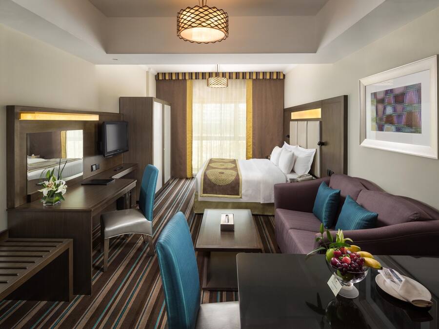 Premium bedding, down comforters, pillowtop beds, in-room safe
