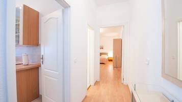 Tabla de planchar con plancha, cunas y camas plegables/adicionales