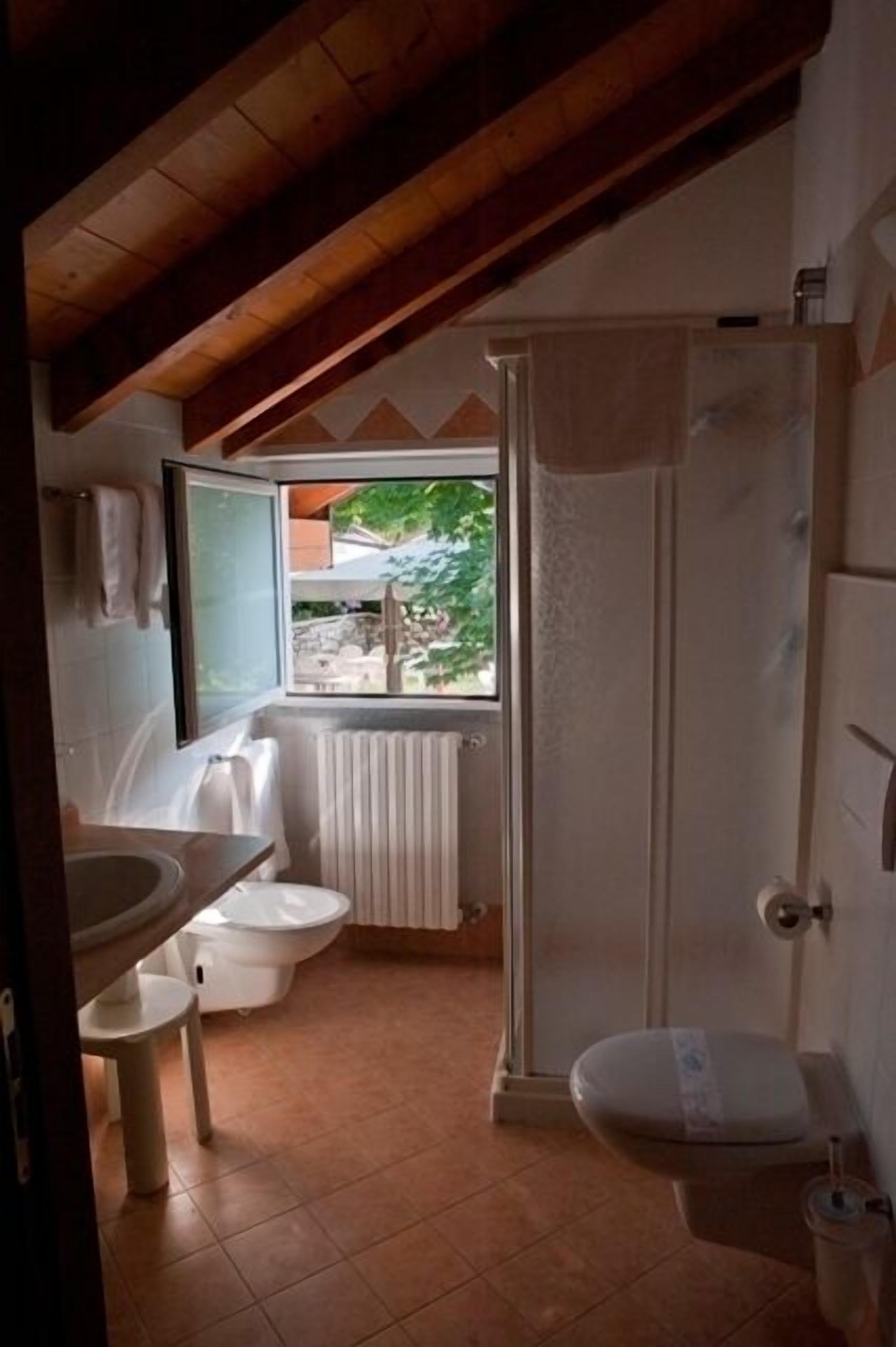 single room | bathroom | rainfall showerhead, free toiletries, hair dryer, bidet
